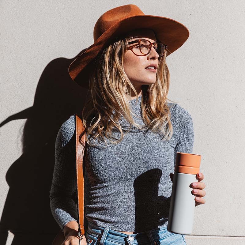 Girl holding Circular and Co Reusable Water Bottle