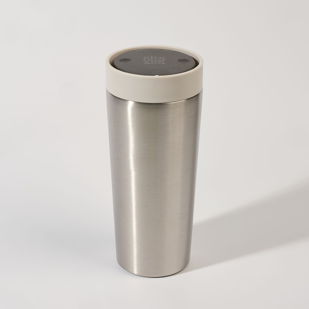 steel reusable cup with white lid