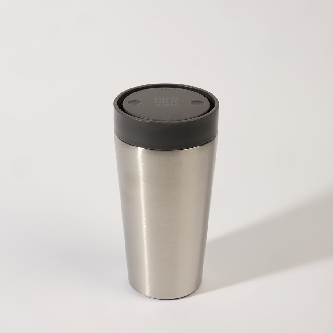steel reusable cup with black lid