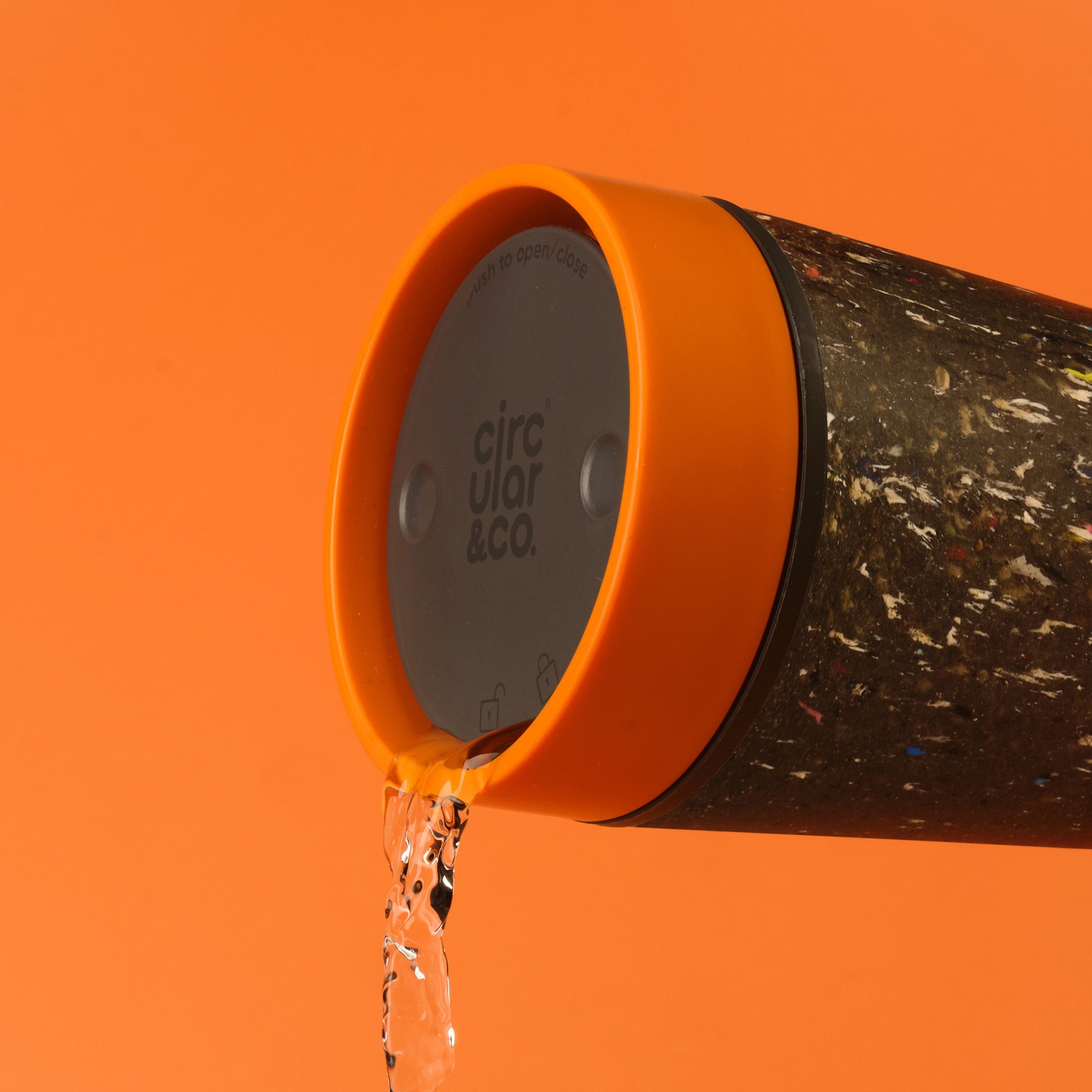 Circular&Co Reusable Coffee Cup Made From Recycled Trainers Sunrise Orange 360 Drinking